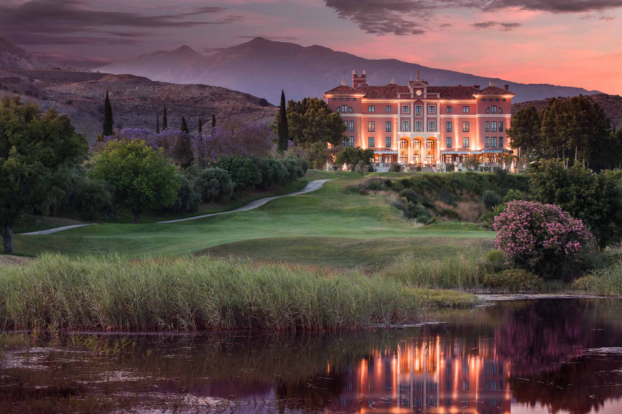 Anantara Villa Padierna Palace at sunset with golf course and mountains – one of the best spa Marbella luxury retreats