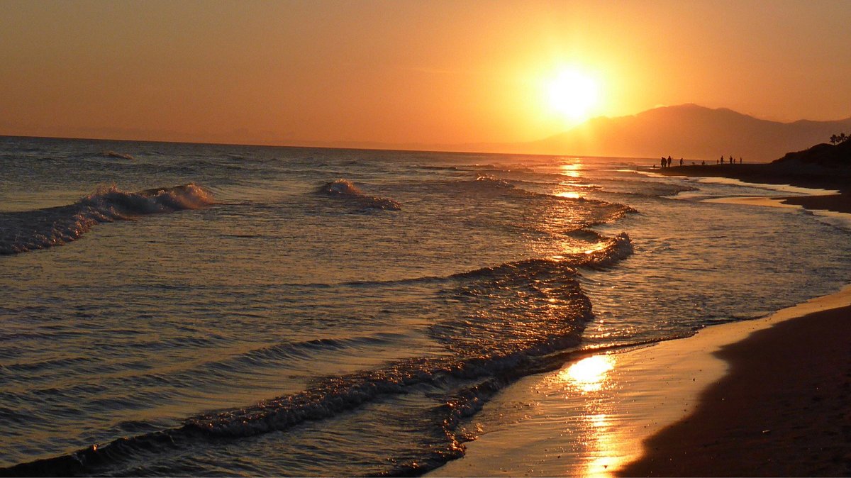 Golden sand dunes and sea at Cabopino Beach Marbella